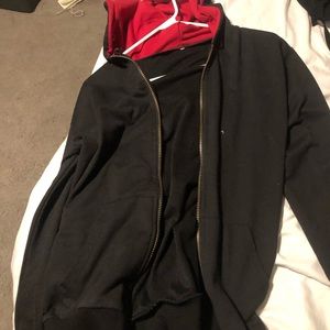 Black hoodie with red hood